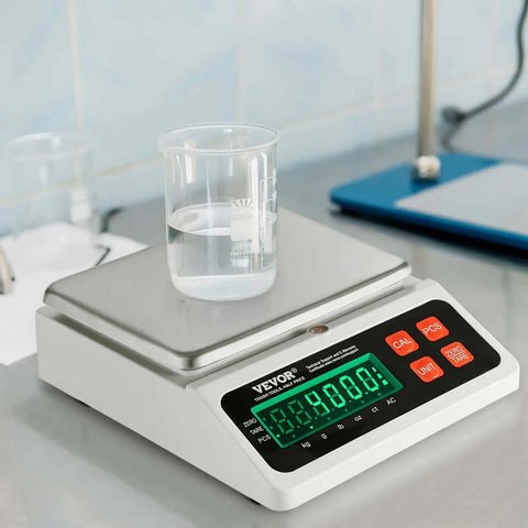 Industrial Counting Scale for Parts and Coins With 10 Kg Capacity featuring LED display, shown with beaker on stainless steel pan.