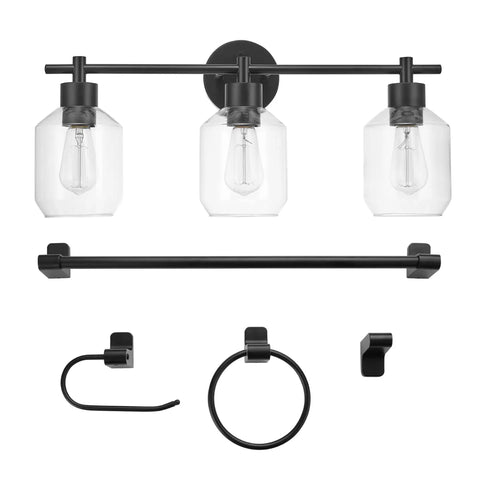 All In One 5 Piece Bathroom Set With 3 Light Vanity Fixture Matte Black Finish Clear Glass Shades Towel Bar Towel Ring Robe Hook And Toilet Paper Holder For A Slick Modern Industrial Look, complete view with lights on and all five pieces shown. The matte black finish is modern and industrial, each piece visible showcases a cohesive design style.