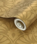 Glow Up Your Space With Top Shelf Abstract Scalloped Gold Metallic Wallpaper For Modern Interiors Eco Friendly PVC Free Wallcoverings Made In America Paste The Wall Ready, showing roll with scalloped gold pattern.