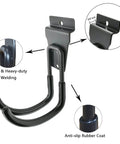 Close-up of heavy-duty slatwall hook with anti-slip rubber coating, showing welding detail and mounting size for garage organizer.
