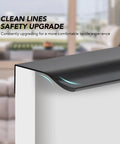Close-up of a black finger edge pull on a cabinet corner, highlighting the sleek and modern design, with clean lines and safety focus.