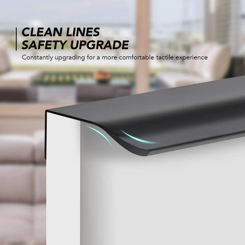 Close-up of a black finger edge pull on a cabinet corner, highlighting the sleek and modern design, with clean lines and safety focus.