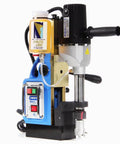 Champion RotoBrute AC35 MiniBrute magnetic drill press, blue metal body with black handles and Brute Lube oil bottle.