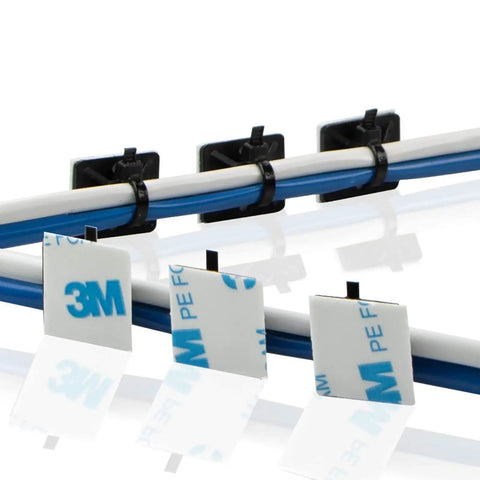 Three Quarters Inch Black Cable Zip Tie Mounts With Adhesive Backing, securing blue and white cables in an organized line