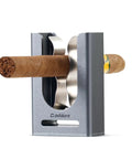 Pocket-sized magnetic cigar holder for golfers with adjustable clip, fits 30 to 60 ring gauge, in medium gray aluminum alloy.