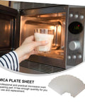 Placing a glass in a microwave with Six Pack Microwave Mica Sheet Heat Insulation Covers For Everyday Use, Waveguide Guard Replacement Kit.