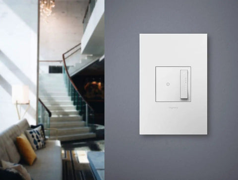 Tru-Universal Dimmer Switch 450W for LED, Incandescent, Halogen, Fluorescent, CFL, mounted on a gray wall with a living room background
