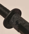 Close-up of handle on Heavy Duty Polypropylene Practice Sword For Martial Arts Training With Durable One Piece Blade And Sheath Safe