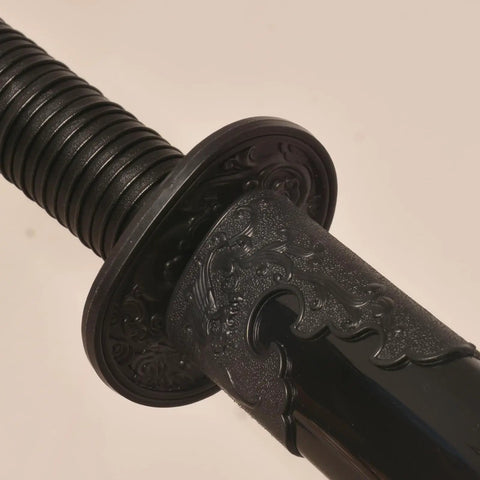 Close-up of handle on Heavy Duty Polypropylene Practice Sword For Martial Arts Training With Durable One Piece Blade And Sheath Safe