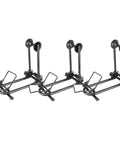 Three black Push In Bike Floor Parking Rack Stand For Mountain, Road And Fat Bikes Up To 5 Inch Tire Width, shown side by side