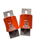 Heavy Duty Cartridge Fuse Rated At 500VDC And 550A For Semiconductor Gear Rail Transit Arrays And Photovoltaic Energy Storage Solutions, two fuses with orange casing.