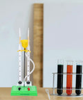 Hydrogen Water Electrolyzer Hands On Electrolysis Demonstration Educational Kit with test tubes in chemistry classroom setup.