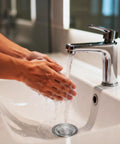 Hands washing in a sink featuring Top Shelf Heavy Duty Stainless Steel Drain Strainer With Hair Catcher For Bathroom And Utility Sink Rust Proof Mesh Filter Basket.