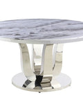 Level Up Your Dining Room With This Top Tier Round White Marble Dining Table Sporting A Sleek Stainless Steel Base And Easy Rotate Lazy Susan For Chill Evening Hangouts. Round marble table with polished steel base, 38-inch diameter.