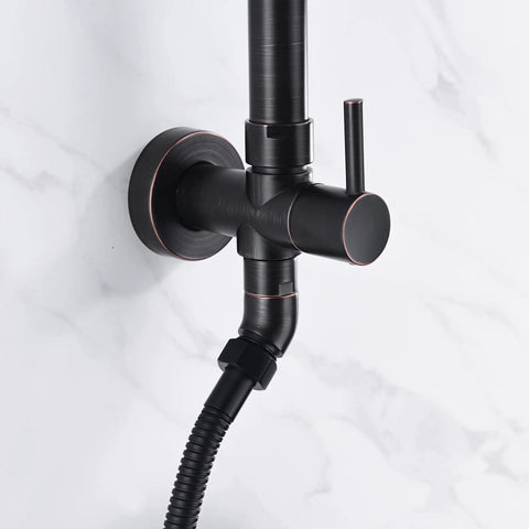 Close-up of valve connection on Oil Rubbed Bronze Shower System For Retrofit And Remodel With 9 Inch Rain Shower Head