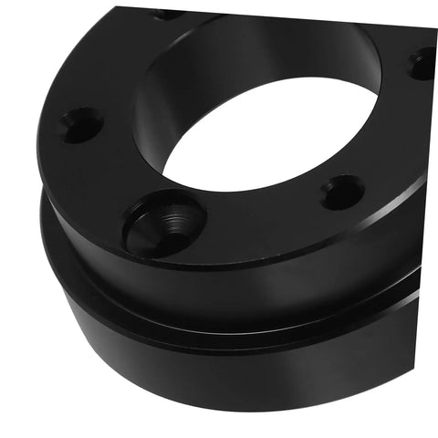 Close-up of durable alloy Racing Steering Wheel Adapter Plate For Modified Cars And Sim Racing Durable Alloy Wheel Adapter Easy To Install Beefed Up Steering Upgrade Part For Car Accessories, showing holes for mounting