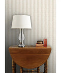 Botanical Stripe Vinyl Wallpaper With Subtle Leather Texture And Dang Durable Type Two Commercial Grade Wallcovering on beige wall.