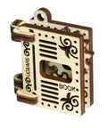 Self Assembly Tribiks Anti Stress Wooden Mechanical Models Kit For Adults And Kids Five And Up Four Miniature Models Desk Toy For Stress Relief Creative Wood Craft Set That Sparks Focus And Fun. Beige wooden book-shaped model puzzle