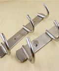 Heavy Duty Stainless Steel Wall Mount Hooks Low Profile Hidden Storage Setup Hella Durable Rust Resistant Key And Coat Rack Three Pack showing close-up of hooks.