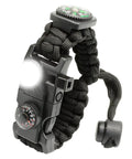 20 In 1 Paracord Survival Bracelet With SOS LED Light Fire Starter Compass Whistle And Thermometer shown with lit LED and compass