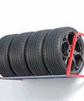 Heavy Duty Wall Mounted Tire Storage Rack For Garage Workshop Hella Solid Cold Rolled Steel Adjustable Multi Tire Organizer Holds Five Car Or Motorcycle Wheels With Mounting Kit Included, showcasing five tires stored securely on a wall rack.