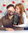 A woman surprises a man with a gift box of Must-Have Rechargeable LED Work Light For Mechanics With Magnetic Base.