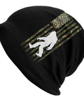 Cozy Camo American Flag Bigfoot Sasquatch Beanie Hat for Men and Women showing camo flag and Bigfoot graphic design.