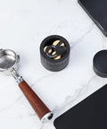 Geared Espresso Leveler And Magnetic Coffee Needle Distributor For 51 54 58 Millimeter Portafilters with wooden handle and black base.