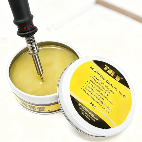 Pro Grade Lead-Free Rosin Solder Flux Paste No Clean For PCB Chips Motherboards Electronics, open tin with soldering tool inside.