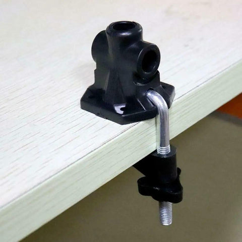 Rock Solid Desk Lamp Mount with Swing Arm Clamp Holder Fits Anything Under 12 Mm Tube for DIY Table Lamps and LED Fixtures is shown mounted on a desk edge.