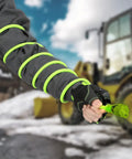 Person holding Heavy Duty Indoor Outdoor Extension Cord 50 Ft 14/3 AWG SJTW With Lighted Plug Go To Workhorse in snowy site