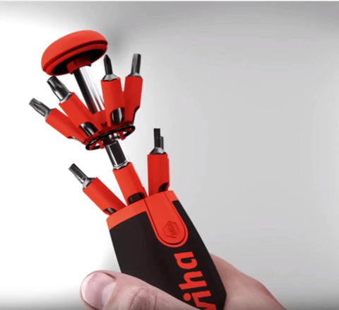 Close-up of 26InOne Ultra Driver Set 14 Piece Kit With Magnetic Bits And Precision Screwdrivers in hand