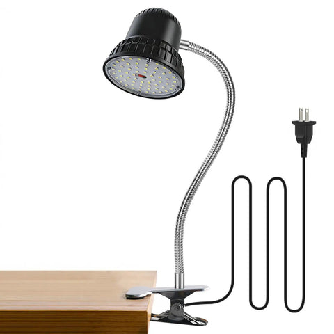 Clamp Light With 3000 Lumen Bright White 6500K Task Lamp Pro Grade Heavy Duty Metal Clamp Base For Shop Garage Woodworking Crafting And Sewing Versatile Work Lighting With 98 Inch Cord attached to wooden table.