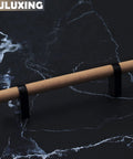 Six Pack Solid Wood Cabinet Handles And Pulls 4.4 Inch Center T Bar on dark marble surface
