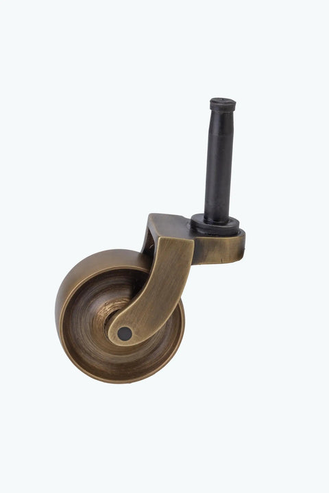 Heavy Duty Antique Brass Replacement Caster Wheels Smooth As Butter Rolling For Furniture Set Of Four Compact Rollers One Three Eighth Inch Diameter Vintage Slick Finish Easy Kit close-up of a single wheel.