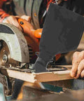 Rugged Heavy Duty Black Miter Saw Dust Collection Hood Pair With Zippered Table Saw Bag Polyester Dust Control Setup in use with a miter saw.