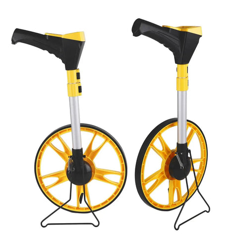 Two angles of the ULTRAK M180 Digital Measuring Wheel - Feet/Meters, Backlit Display & Memory with adjustable handle and bright yellow wheels.