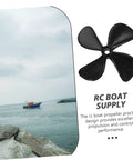Pair Of High-Strength RC Boat Propeller Shaft Set For Fishing And Simulation Boats Replacement Parts For Remote Control Models Easy To Install And Durable Propellers Built Tough For Realistic Runs shown with propeller and boat.