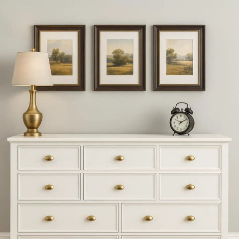 White dresser with 10 Pack Oval Champagne Bronze Cabinet Knobs And Furniture Pulls Single Hole Hardware Handle For Kitchen Cabinets Cupboards Dressers And Wardrobes Great For Modern Homes And Rustic Styles Easy Install Durable Finish, lamp, and clock on top.
