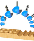 Core Box Router Bit Set For Woodworking With Solid Carbide Double Flute Round Nose, Eight Piece Kit, One Quarter Inch Shank, Cutting Diameters From One Quarter Inch To One Inch, Anti Kickback Design, Fast Cutting, Long Life, Pro Grade displayed with routed wood samples