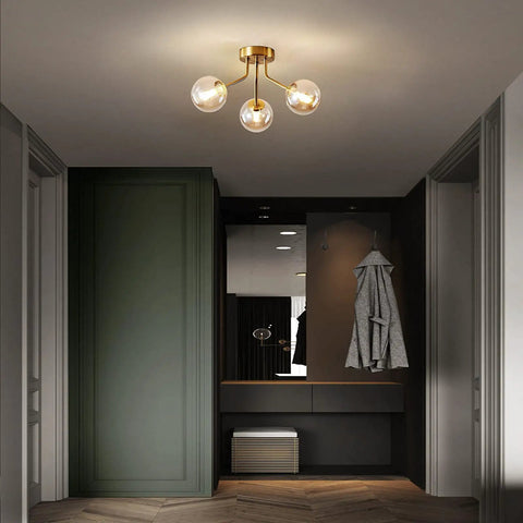 Three Light Sputnik Chandelier In Bold Gold Finish Semi Flush Mount Ceiling Light Fixture With Glass Globe in hallway