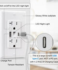 White USB Wall Outlet With Night Light And Manual Switch, Tamper Resistant Usb C And Type A Ports close-up view with charging cable.