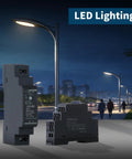 Ultra Slim Step Shape DIN Rail Power Supply 5V 2.4A 12W Switching Module beside LED street lights in urban night scene.