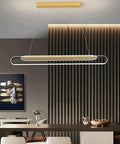 Long Ring Pendant Light With Acrylic Shade, Modern LED Ceiling Hanging Lamp For Living Room And Kitchen in dining area