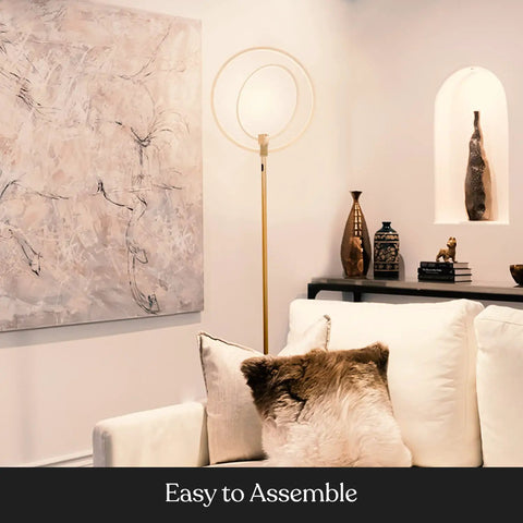 Eclipse Dope Bright Modern LED Torchiere Floor Lamp With Built In Touch Dimmer, gold finish in living room setting