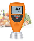 Pro Grade Water Activity Meter For Food Testing And Moisture Control, Smart Tester For Jerky, Dried Fruit, Grains And Veggies, orange handheld unit on base
