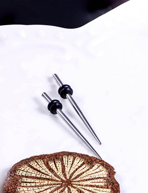 14 Gauge Ear Gauges Stretching Kit Set With 316L Surgical Steel Tapers And Insertion Pins on white background