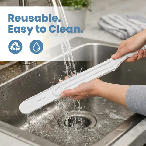 Person cleaning Paint Behind Toilet Tool Kit With 12-Inch Reach Flat Brush under running water in kitchen sink
