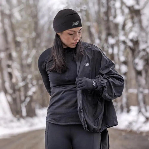 Person wearing Lightweight Running Skullcap Beanie Cap For Men And Women Breathable Moisture Wicking Gym Ready Hat Black