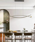 Dope Black Brass Long Strip Suspension Lamp With Adjustable Cable Up To One Point Five Meters over dining table